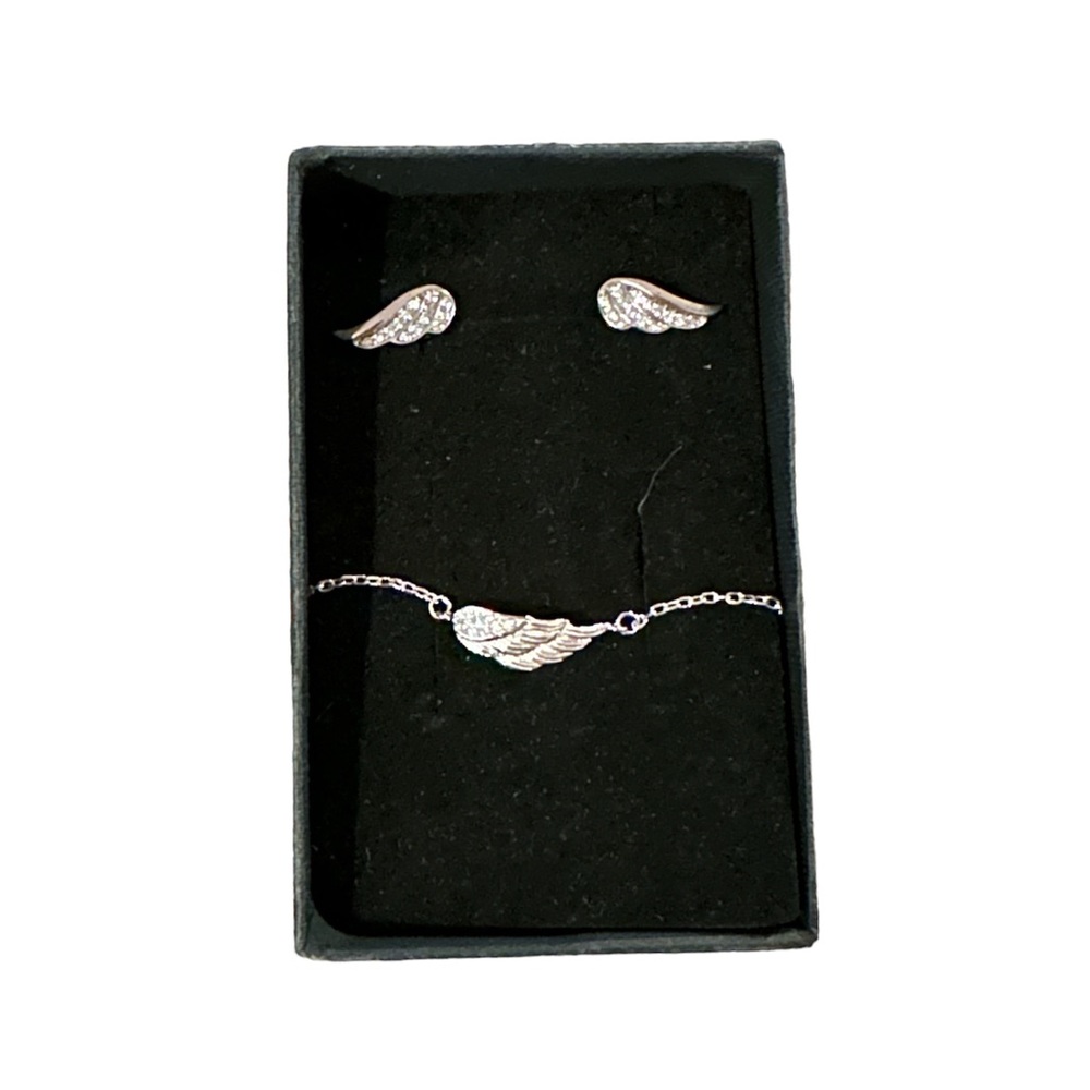 NWT matching angel wings stud earrings and bracelet.